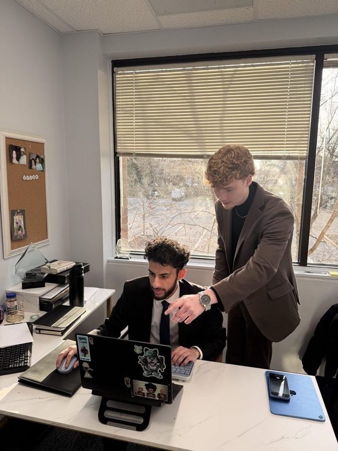 NorthCrest Capital team members collaborating at a desk